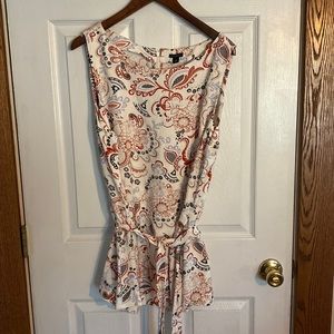 Sleeveless linen Ann Taylor top.  Cream with floral. Ties at the waist.
